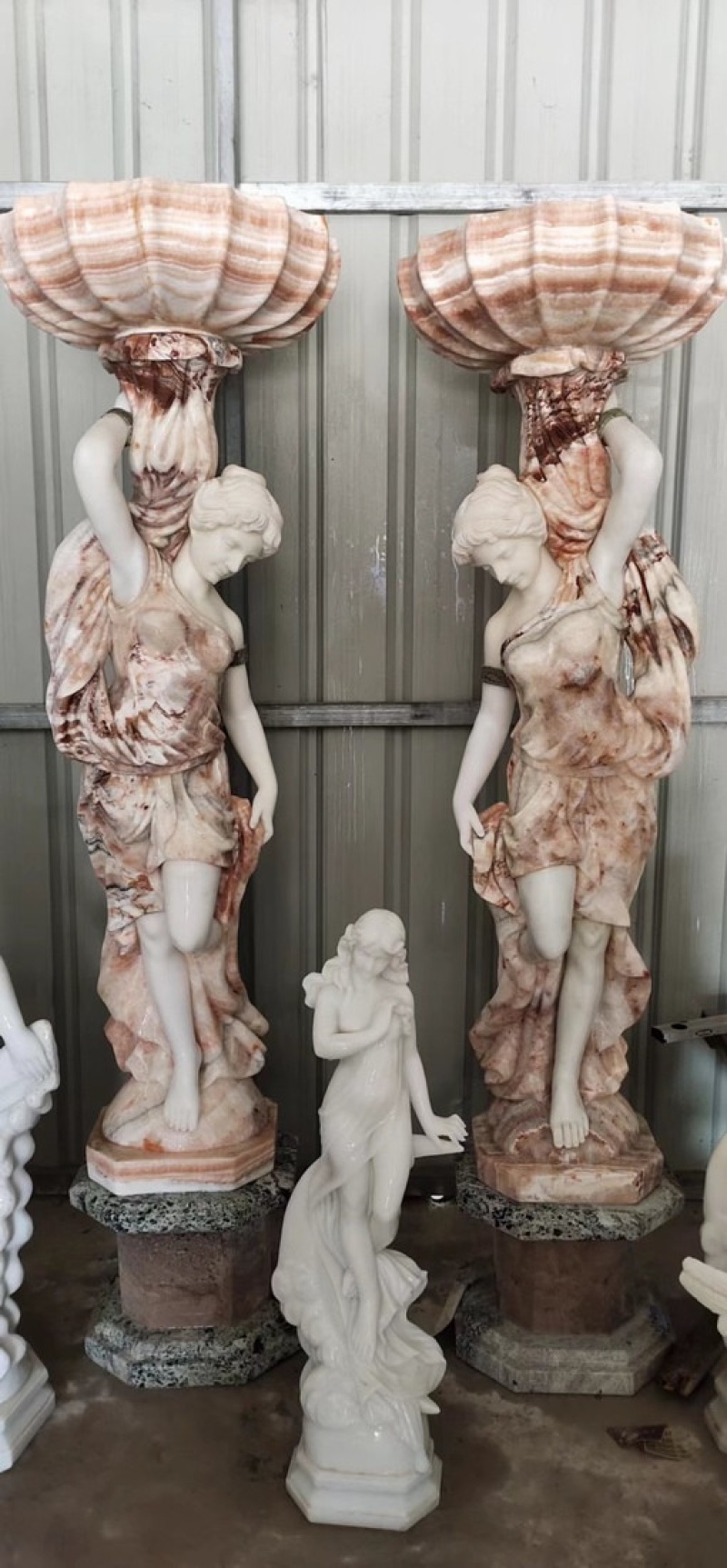 Pair of Marble Ladies Holding Urns