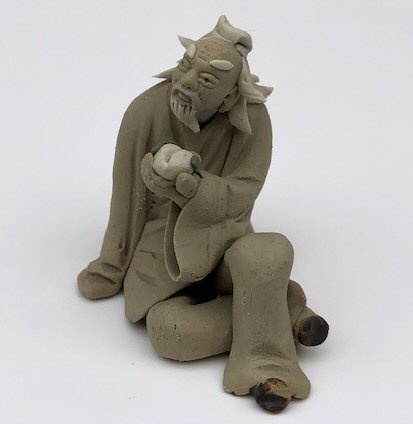 Miniature Ceramic Figurine Mud Man Holding Fruit - 2.5"