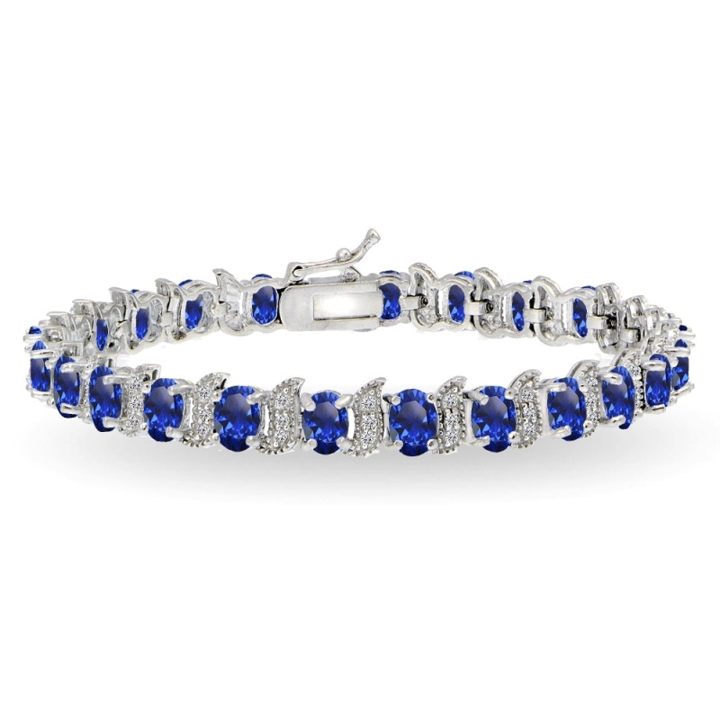 Sterling Silver Created Blue Sapphire 6X4mm Oval And S Tennis Bracelet With White Topaz Accents